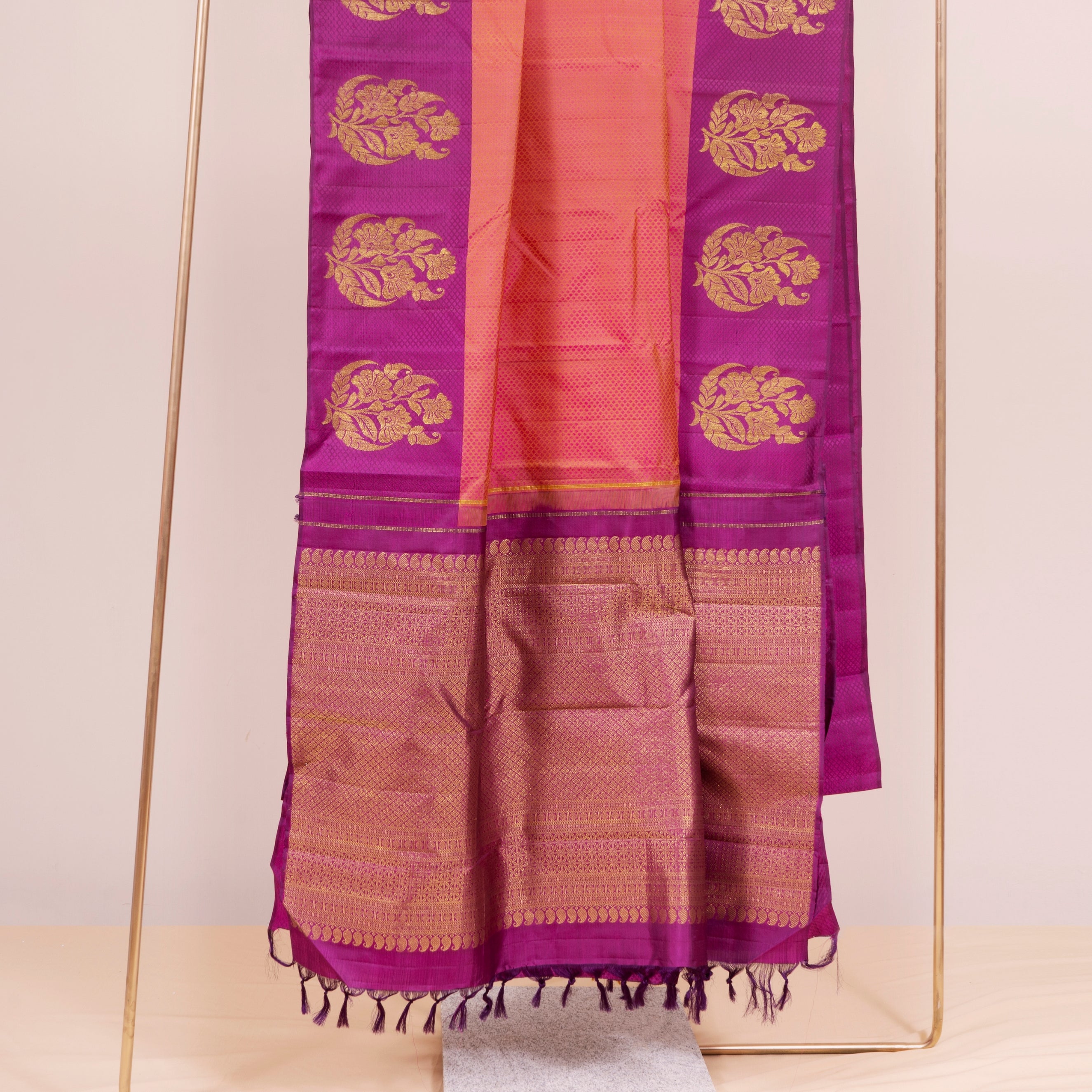 Pink Embossed Silk Saree